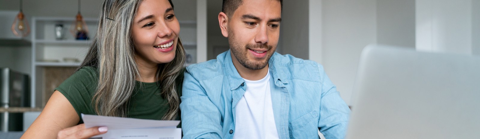 a couple using their laptop computer