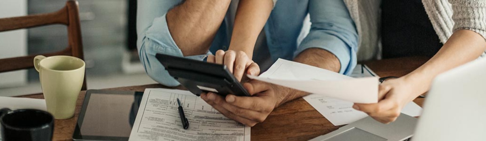 a couple using a calculator