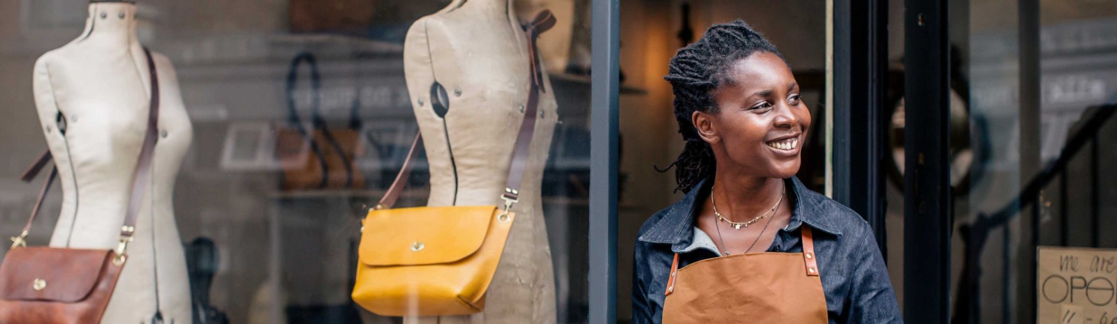 small business owner standing outside
