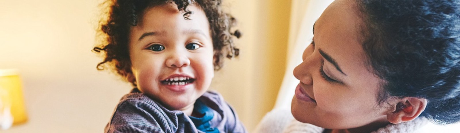 a mother holding her child